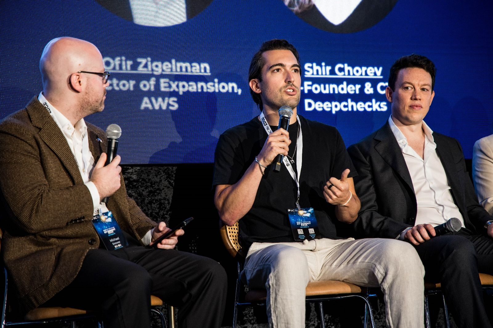 David leading an AI panel discussion